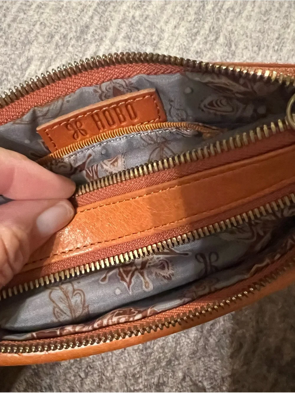HOBO Leather Wristlet Wallet in Coral peach. 7 1/2x5